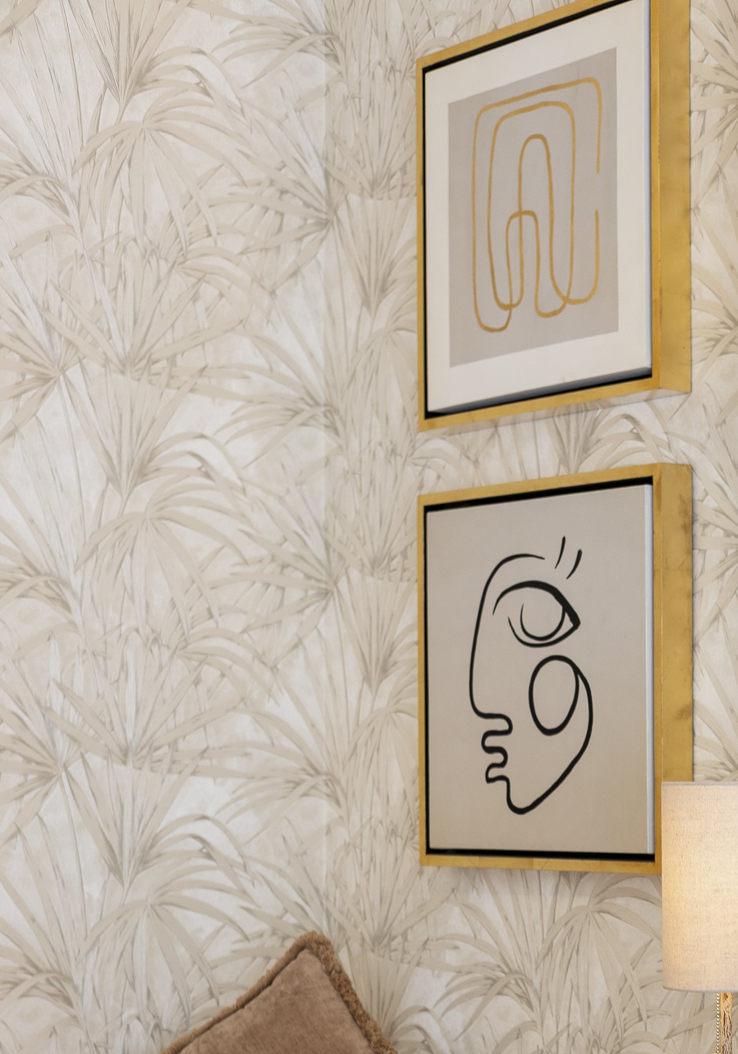 Cream fan palm wallpaper with gold framed line art prints